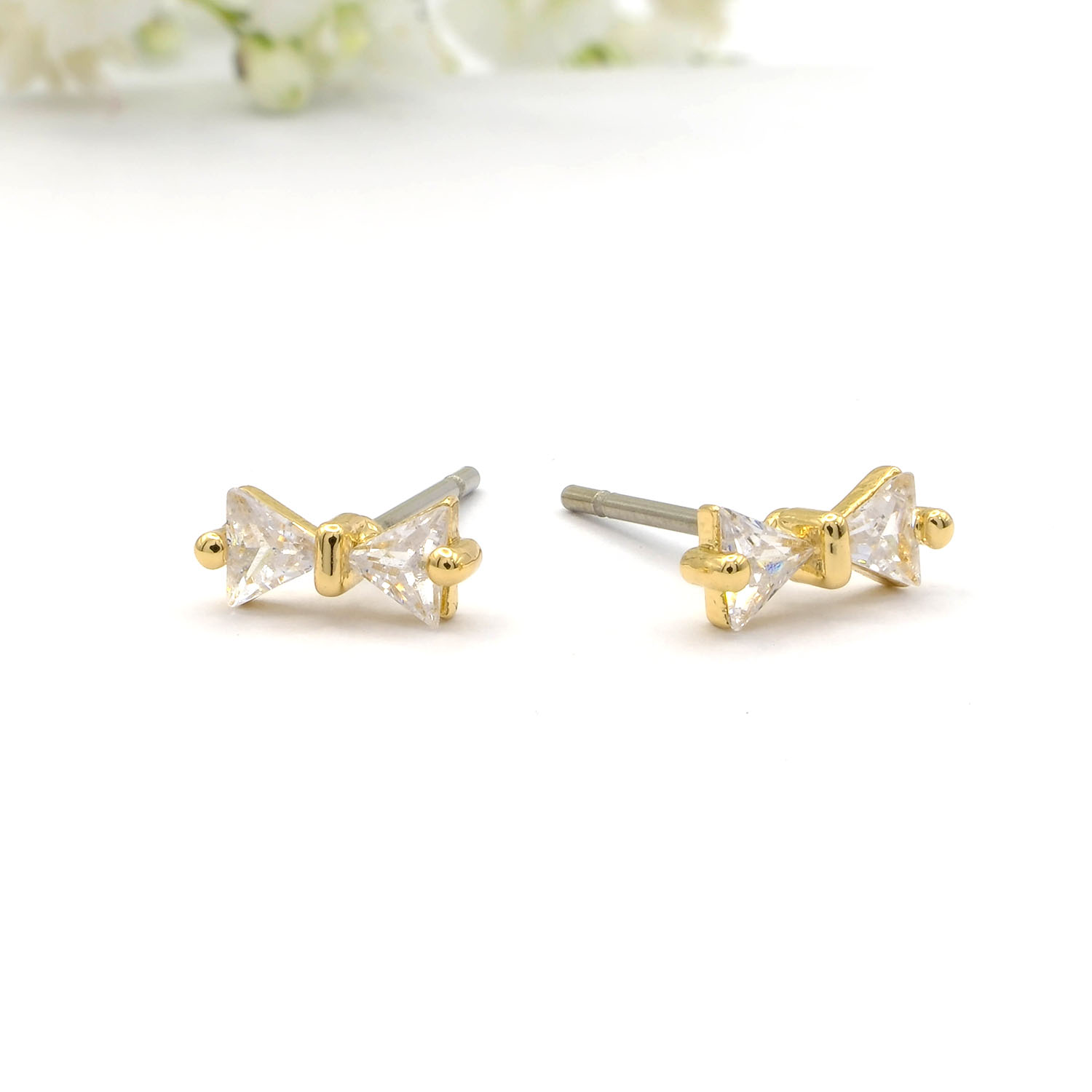 Tiny Gold Bow Studs With Crystal Insert